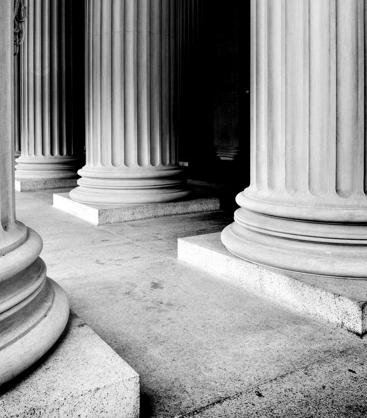 Classical marble colonnade in black and white